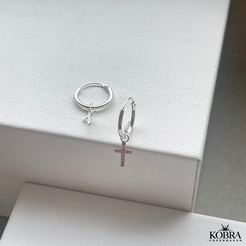 "Justice" Kors reringe i sterling slv til herre