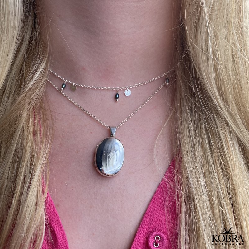 "Lea" slv medaljon med plads til 2 billeder inklusiv gravering