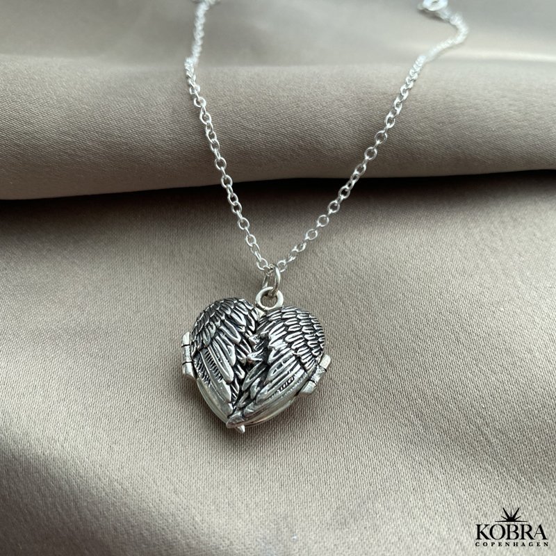 Hjerte slv medaljon "Callie" med plads til 3 billeder