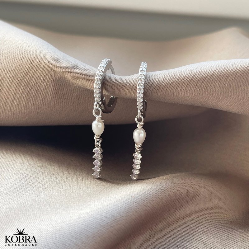 "Xena" smukke perlereringe med sten i slv