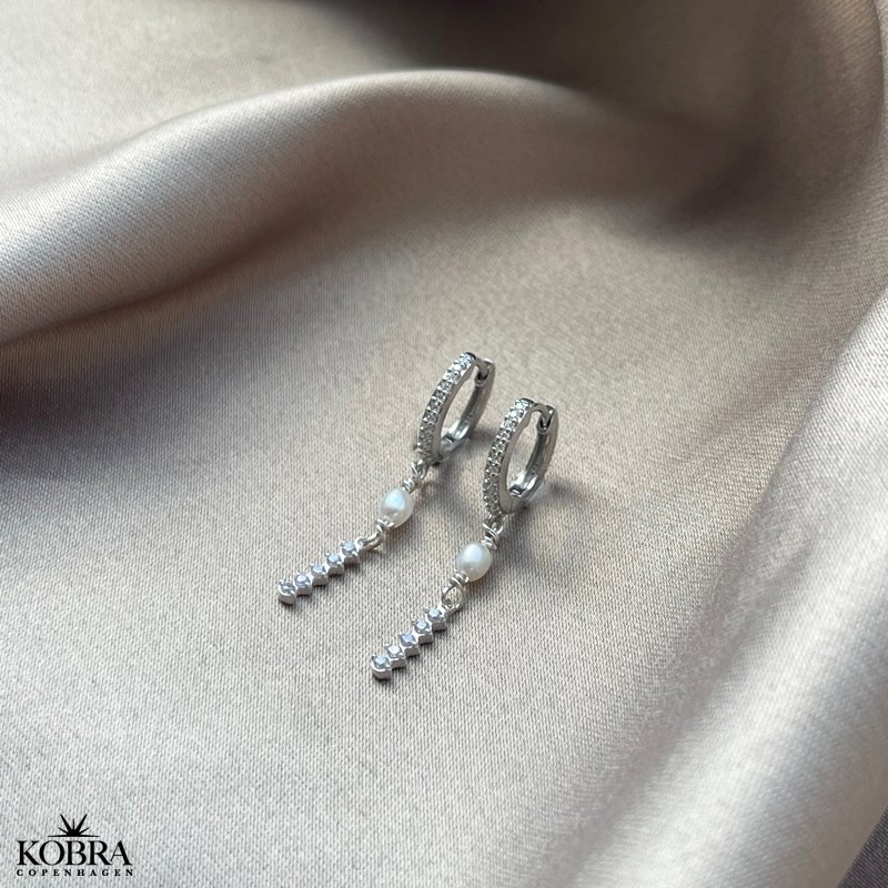 "Xena" smukke perlereringe med sten i slv