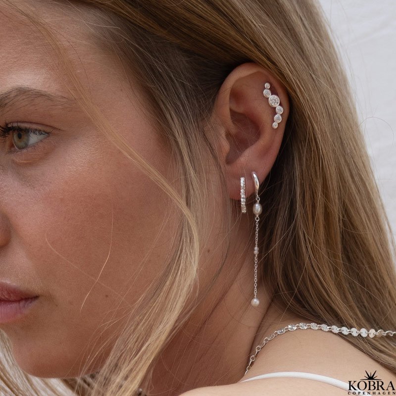 "Solenne" wavy slv reringe med sten