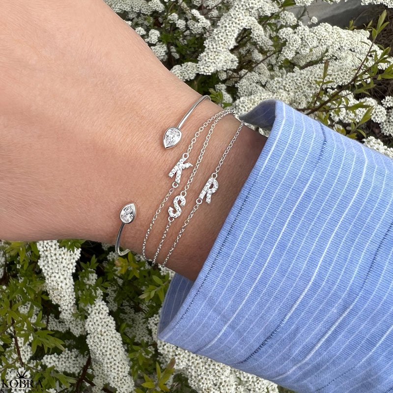 "Alias" silver bracelet with silver letter