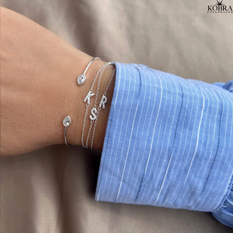 "Alias" silver bracelet with silver letter