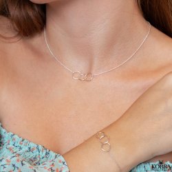 "Olympia" slv armbnd med sm cirkler / ringe