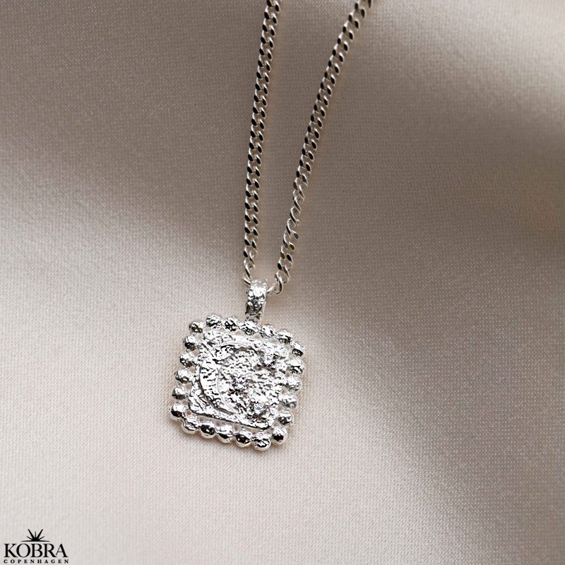 "Moondust" silver necklace with moon and stars