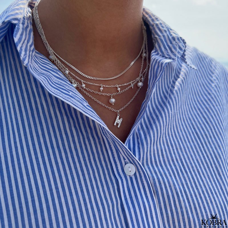 "Alias" silver necklace with your letter