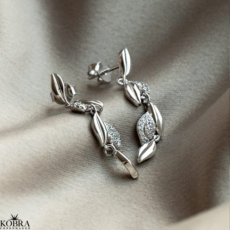 "Milana" Slv reringe med blade og sten