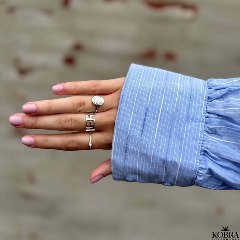 "Suma" simple raw silver ring with small round plate