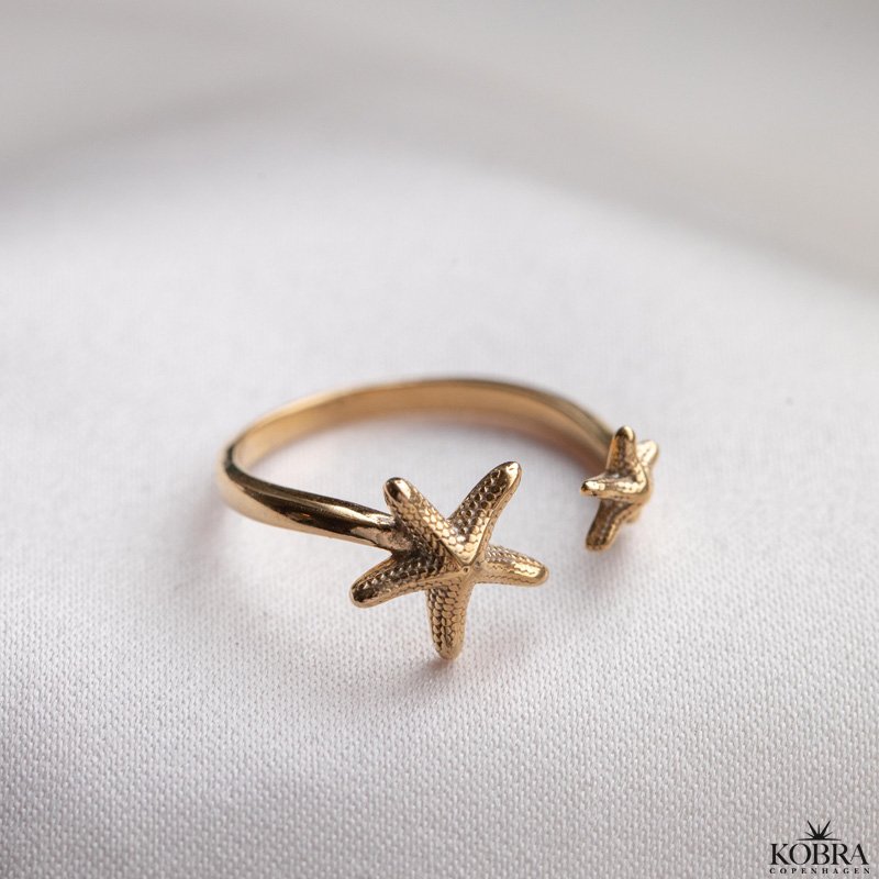 "Stella Marina" guld ring med sstjerner