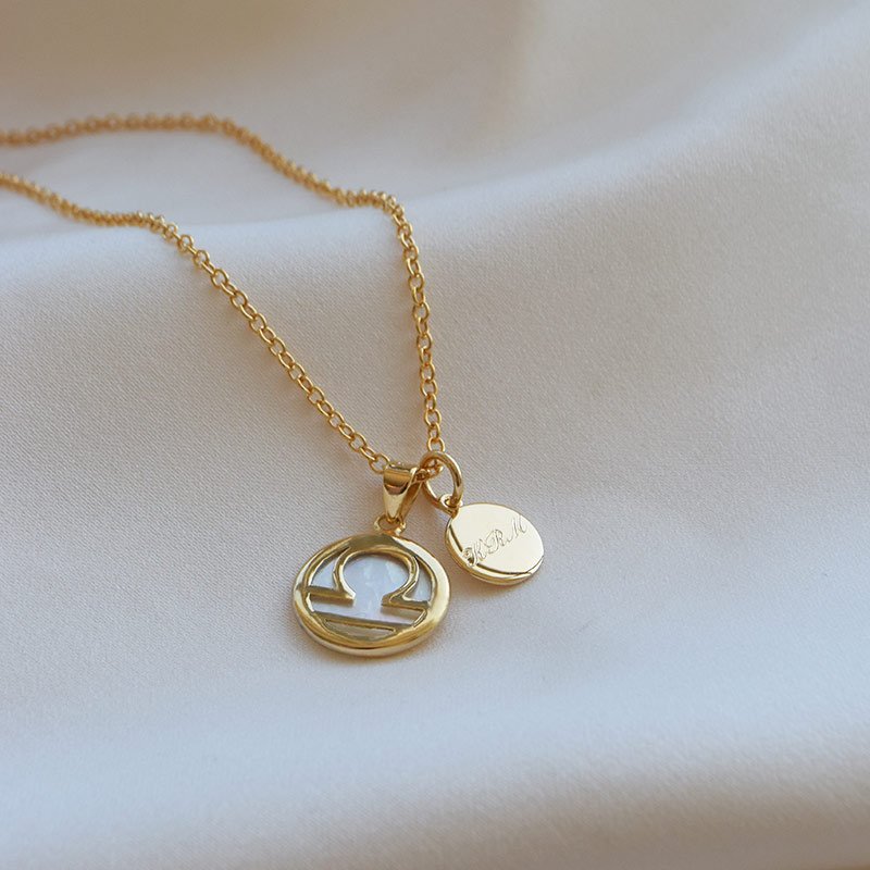 "Stargate" guld halsk�de med dit stjernetegn og lille ID tag inklusiv gravering