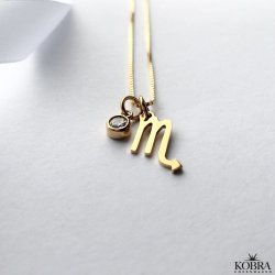 "Hoshi" 18 karat forgyldt Zodiac halskde med lille hvid sten