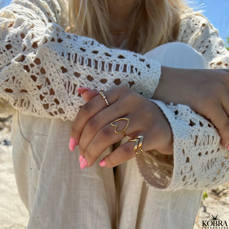 "Beatrice" gold ring with white stones