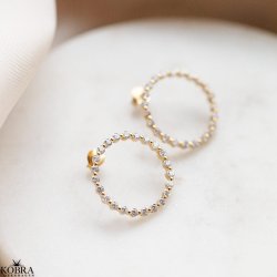 "Janet" guld restikker med hvide zirkonia sten