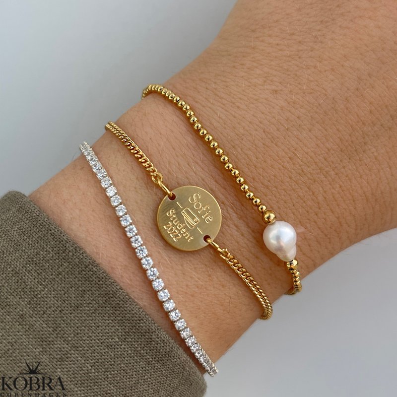 Studenterarmbnd i guld med 2 mm. panzerkde