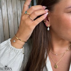 "Vanity" smuk prinsesse forgyldt ring med blå zirkonia sten