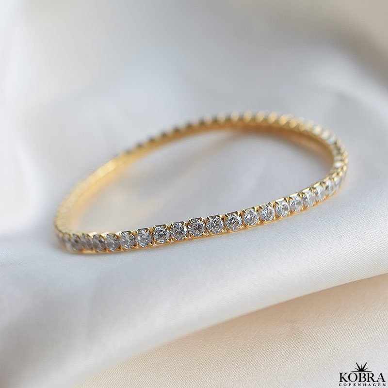 "Honey" 18 karat forgyldt Tennis armbnd med hvide sten