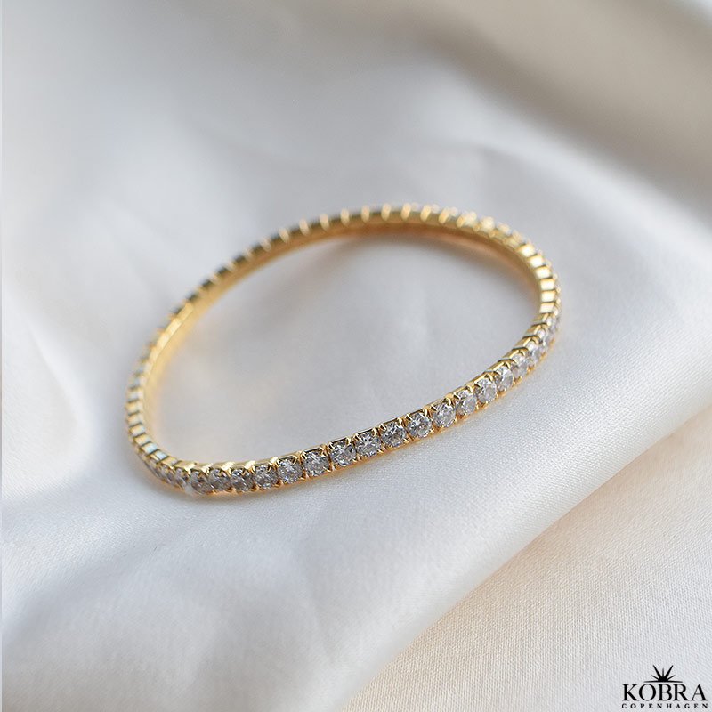 "Honey" 18 karat forgyldt Tennis armbnd med hvide sten