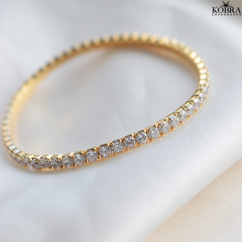 "Honey" 18 karat forgyldt Tennis armbnd med hvide sten