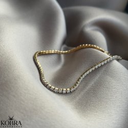 "Ivy" tennis armbnd i guld