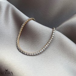 "Ivy" tennis armbnd i guld