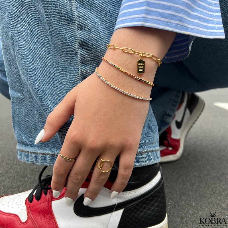 "Ivy" tennis armbnd i guld