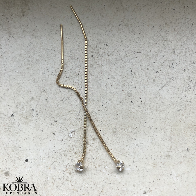 "Lisa" rehnger med hvid sten i 18 karat forgyldt