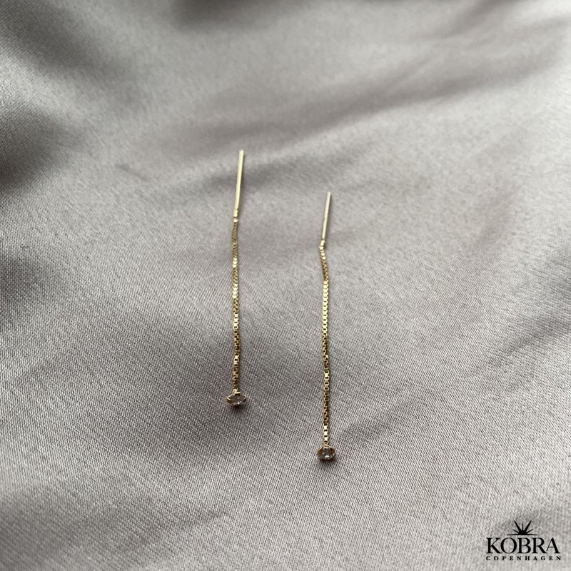 "Lisa" rehnger med hvid sten i 18 karat forgyldt