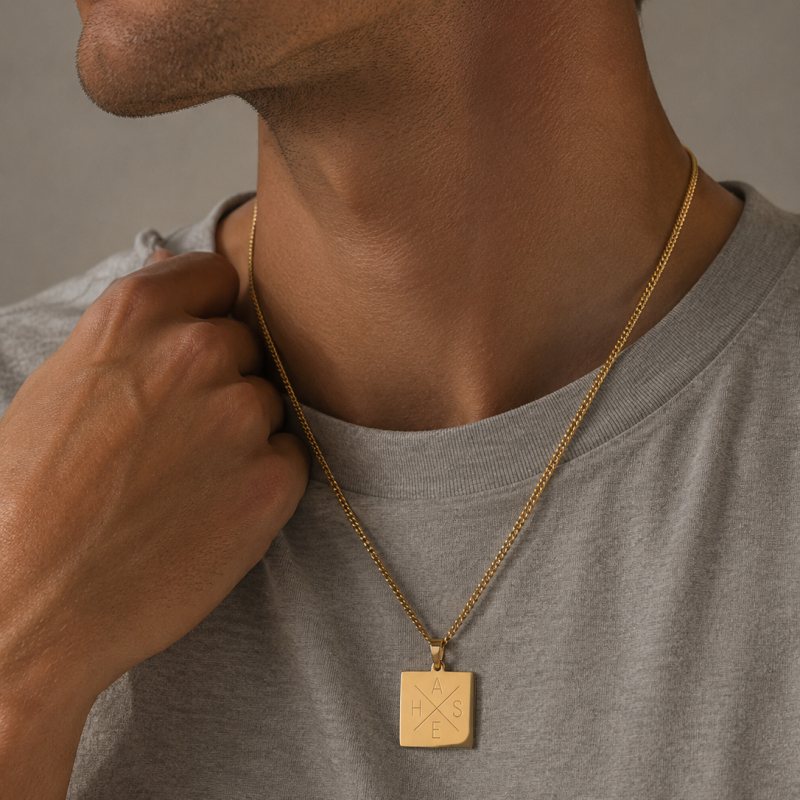 "Trend" necklace in 18K gold-plated stainless steel with cross engraving
