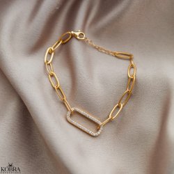 "Trouble" chunky chain with oval center piece with stones in gold