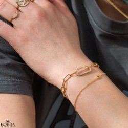 "Trouble" chunky chain with oval center piece with stones in gold