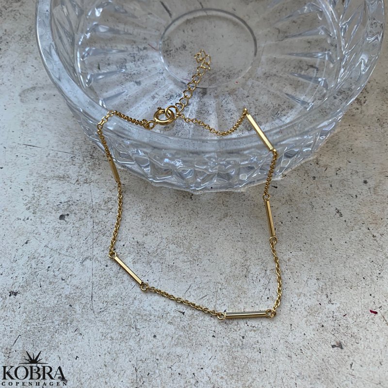 "Holly" forgyldt ankelkde