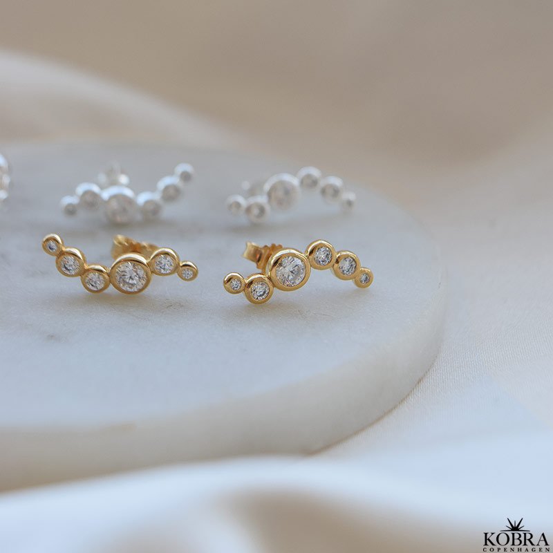 "Solenne" wavy slv reringe med sten