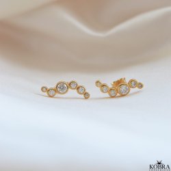 "Solenne" wavy guld reringe med sten