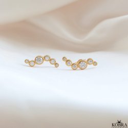 "Solenne" wavy guld reringe med sten