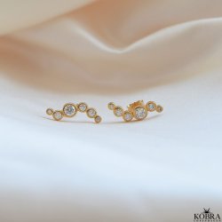 "Solenne" wavy guld reringe med sten