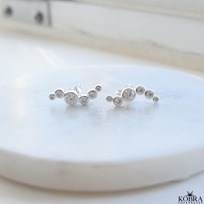 "Solenne" wavy slv reringe med sten