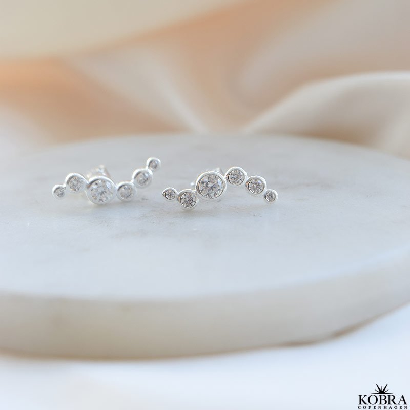 "Solenne" wavy slv reringe med sten