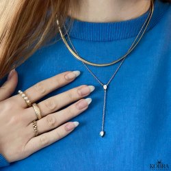 "Yarina" drop halskde i guld med sten