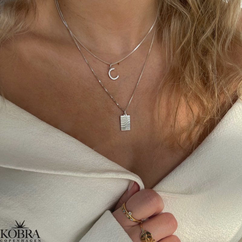 "Zoey" sterling silver letter with white stones